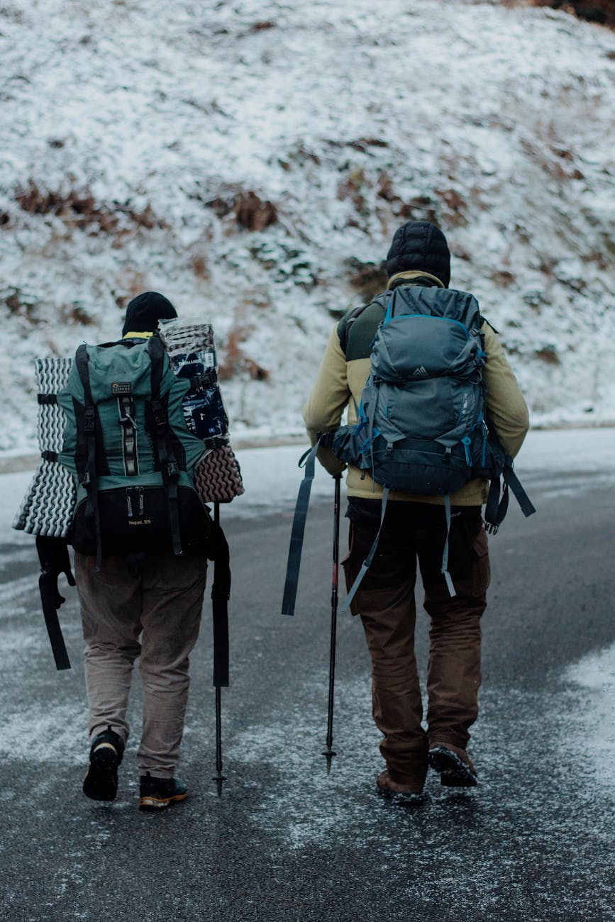 people backpacking in the cold